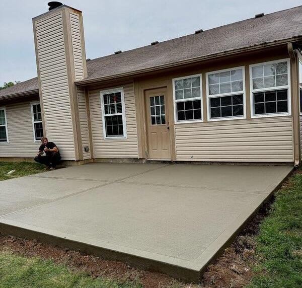 Finished concrete patio with control joints after cleanup