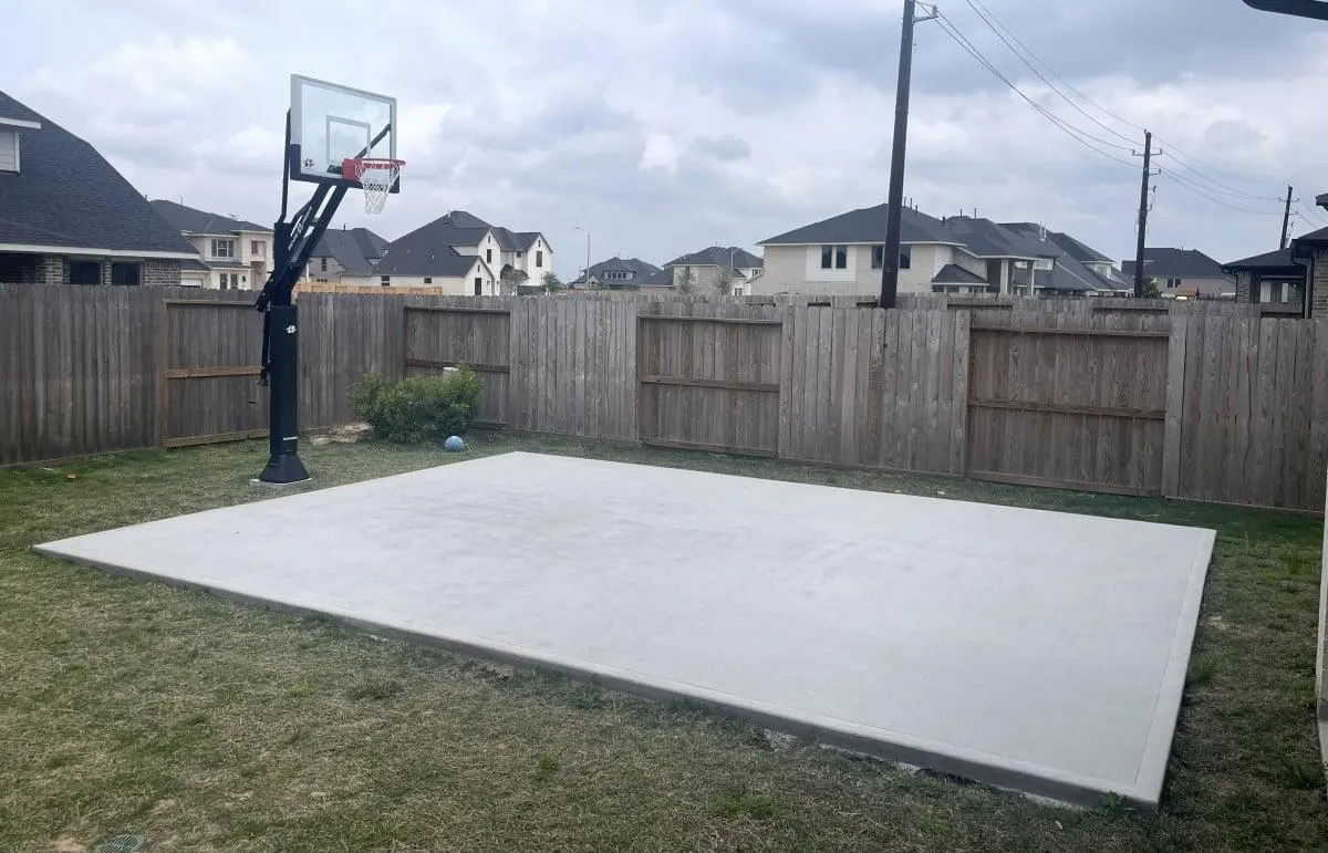 Backyard site being reviewed for a new basketball court