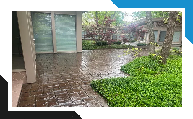 Brown stamped concrete courtyard with enhanced color and surface sheen