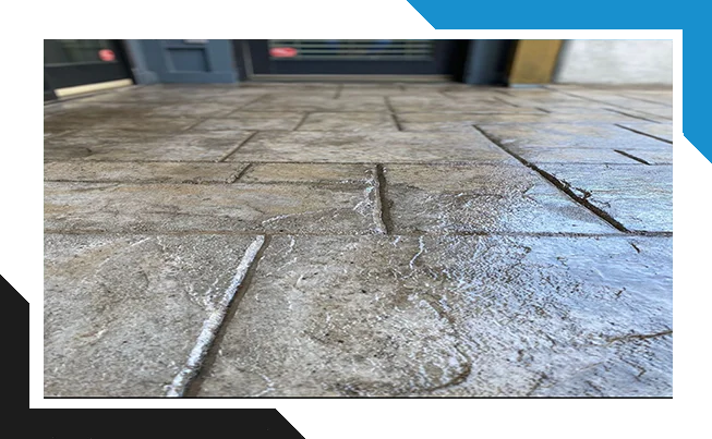 Close-up of textured stamped concrete with a color-enhancing sheen