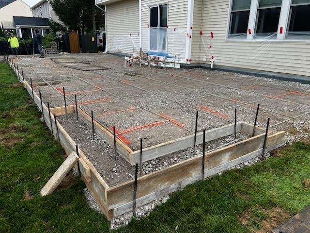 Concrete patio forms set with reinforcement before the pour